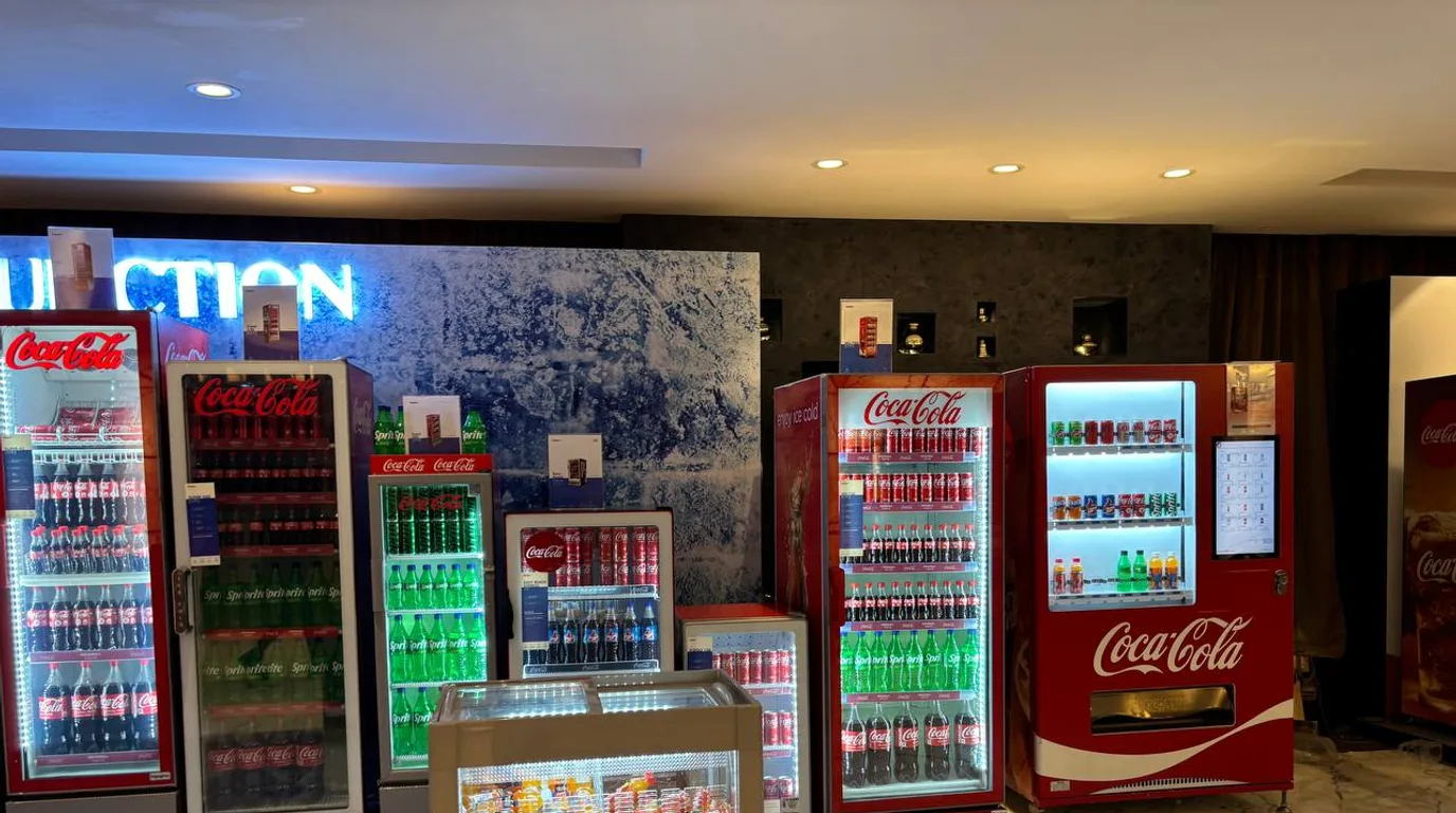 Wendor vending machine drawing attention from commuters in a busy Indian metro station