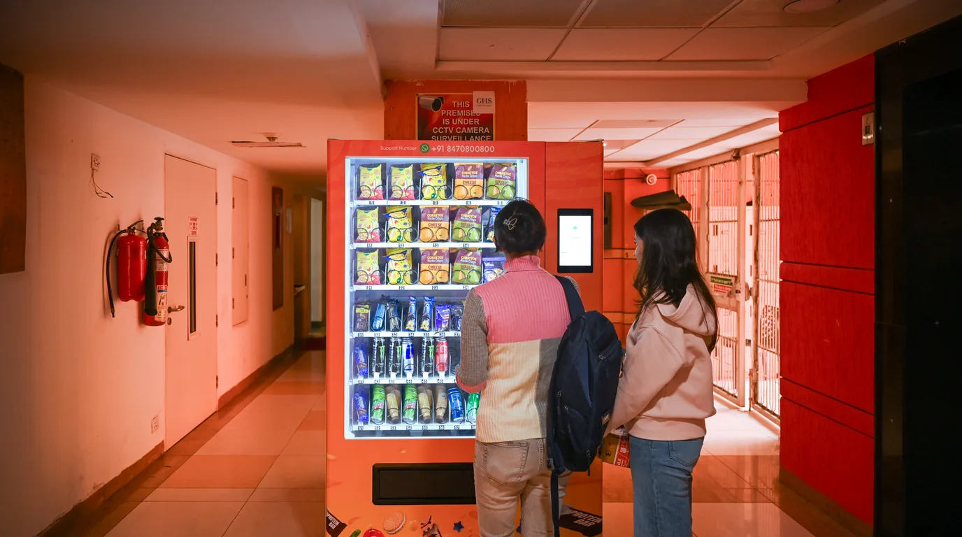 Vending machine in a hospital area with soft-focus hints of other top vending venues