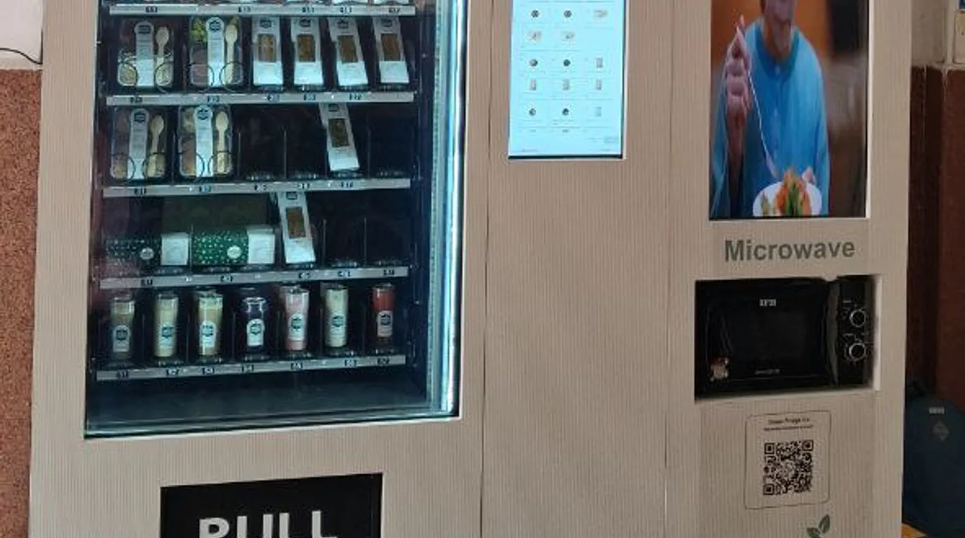 Flat-lay of high-margin vending items including a power bank, cable and earphones