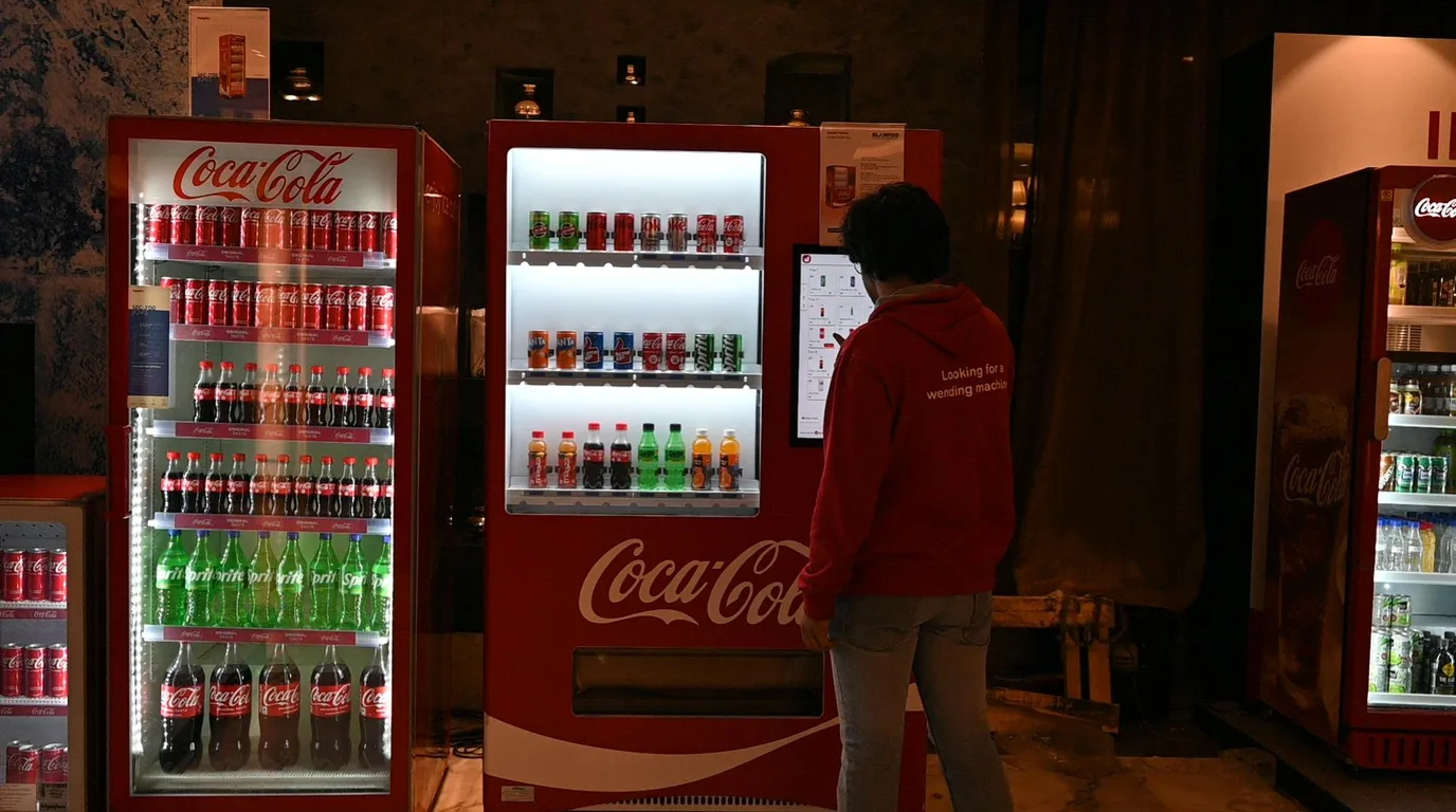 Conceptual desk scene with vending machine icons spread across a stylised map