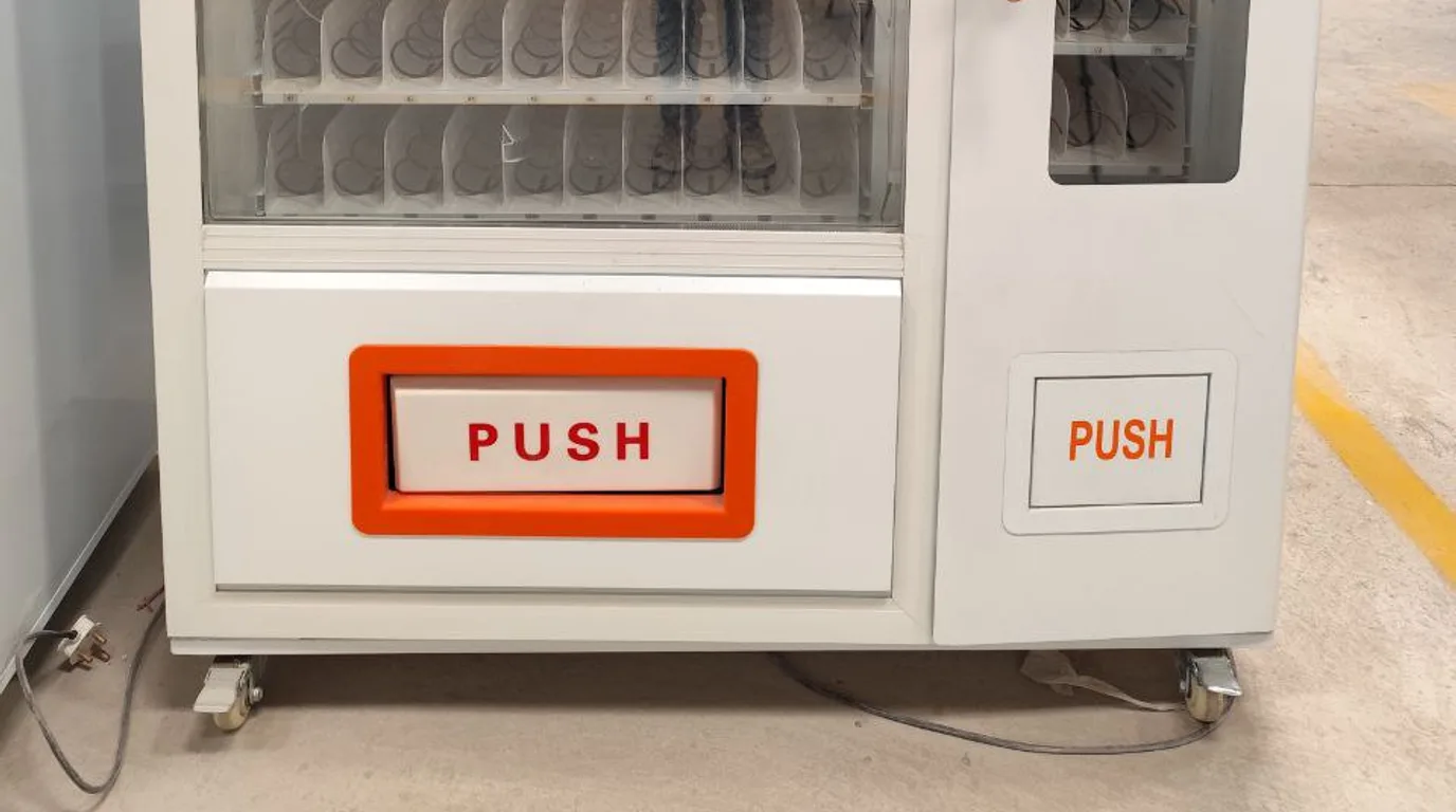 Three vending dispensing mechanisms: spiral coil, robotic arm, and conveyor belt