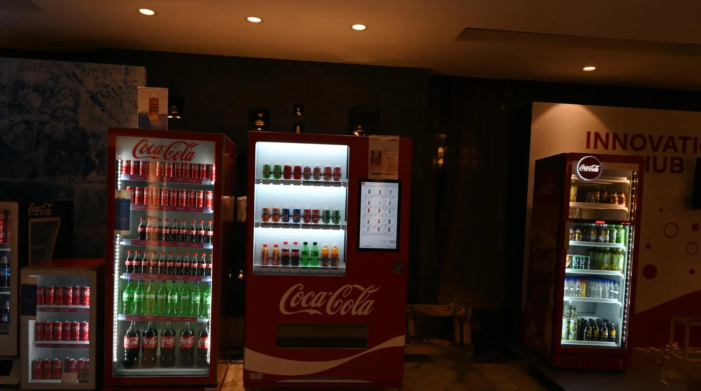 Several vending machine control boards and a DEX reader arranged for brand comparison.