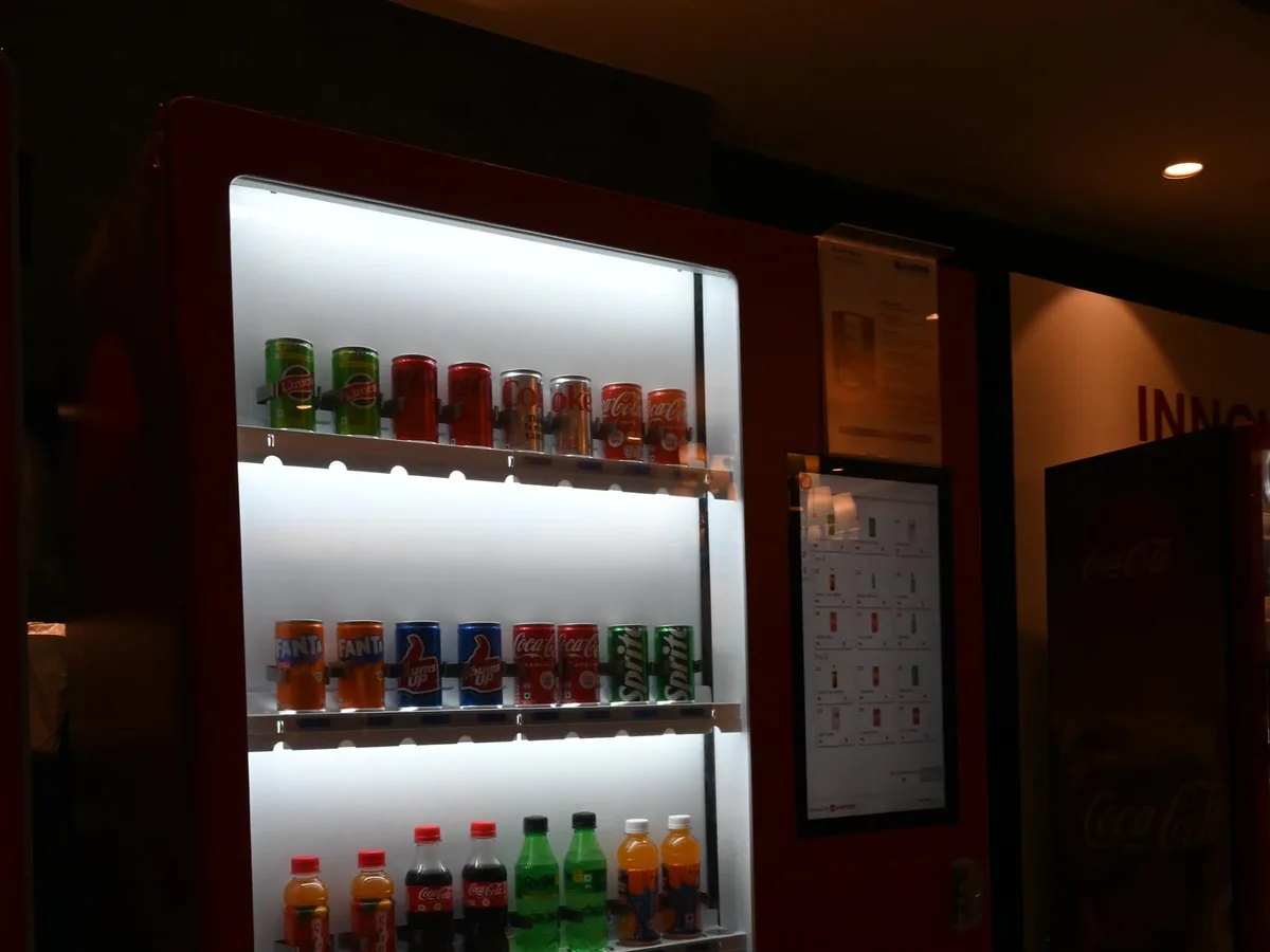 Operator running a calibration sequence on a vending machine bill acceptor menu.