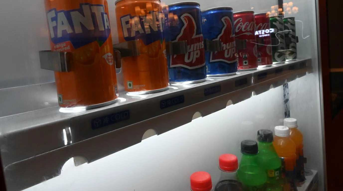 Business owner weighing the convenience and trade-offs of hosting a free vending machine.