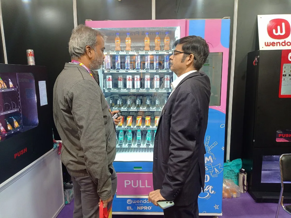 Simple performance dashboard showing vending sales and trends on a laptop and phone.