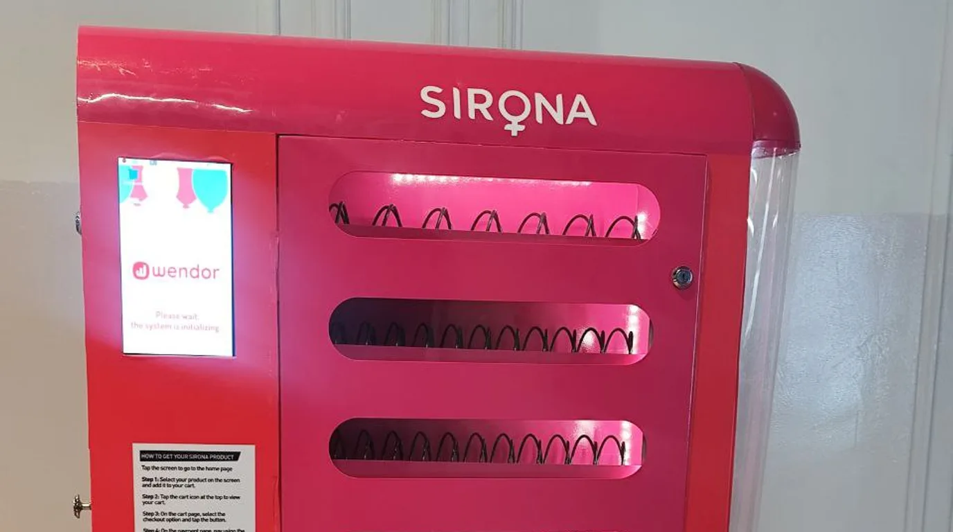 Close-up of a vending machine cashless card reader being reset