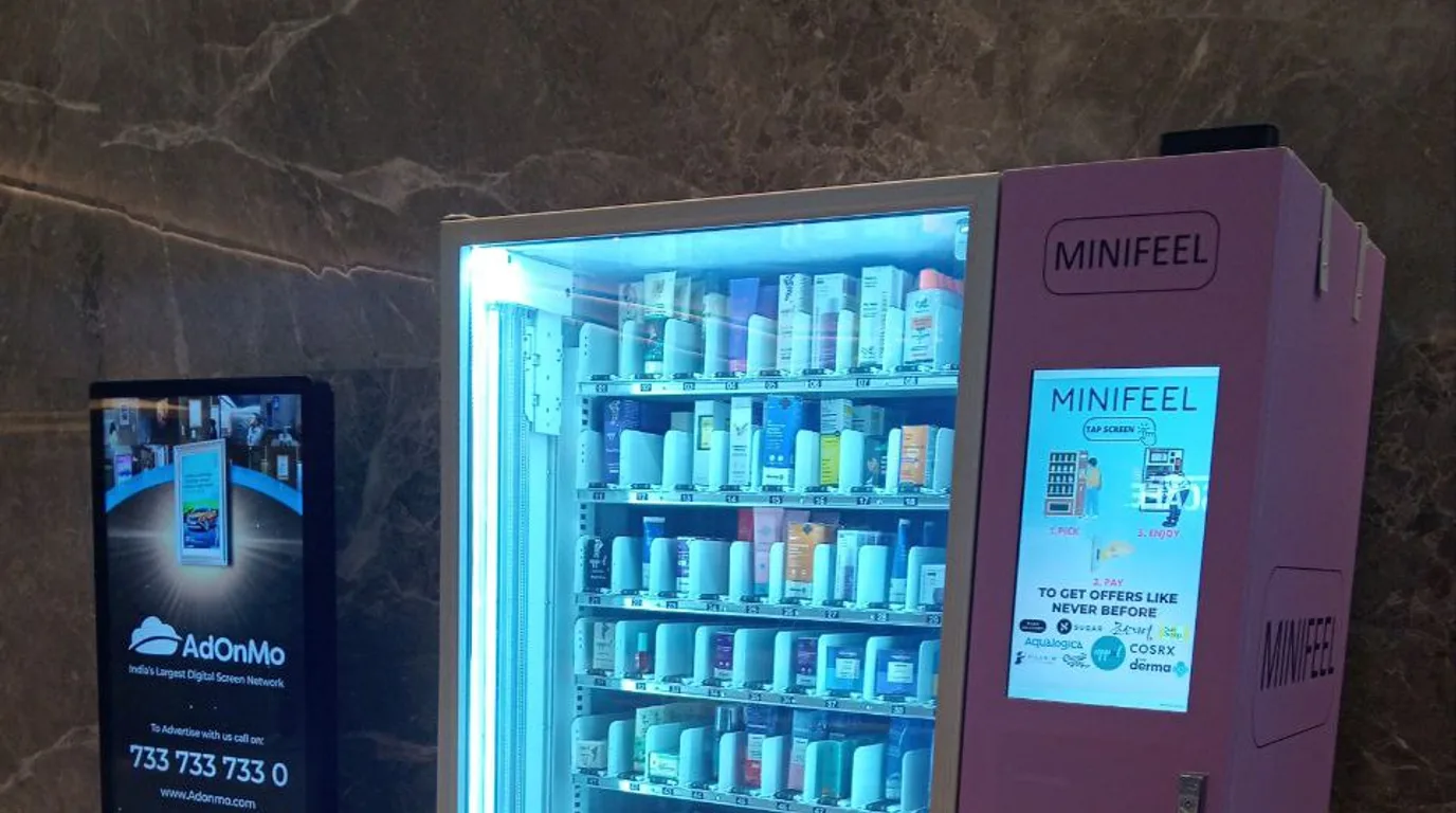 Three identical vending machines representing lease, rent, and buy options