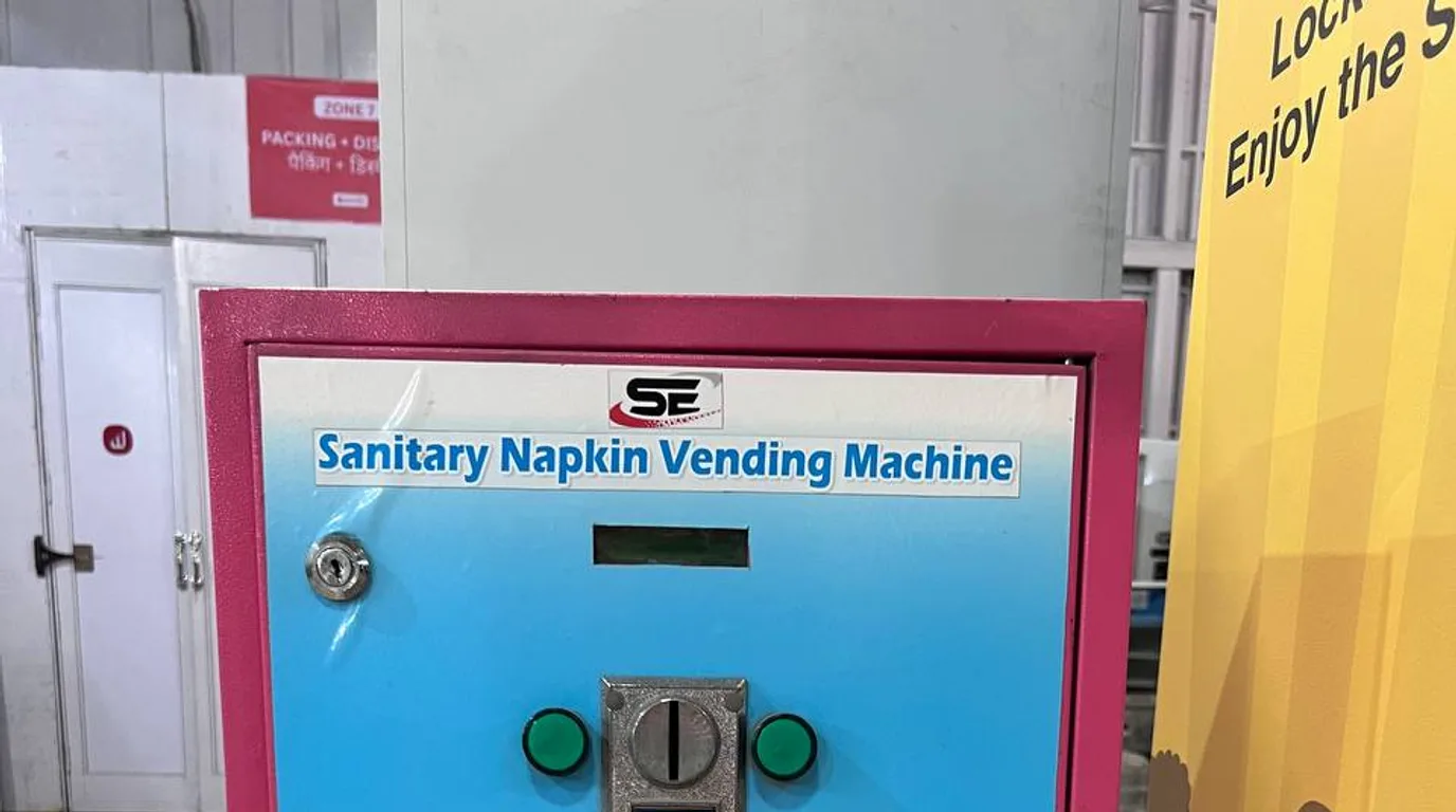 Row of sanitary napkin vending machines representing a growing market