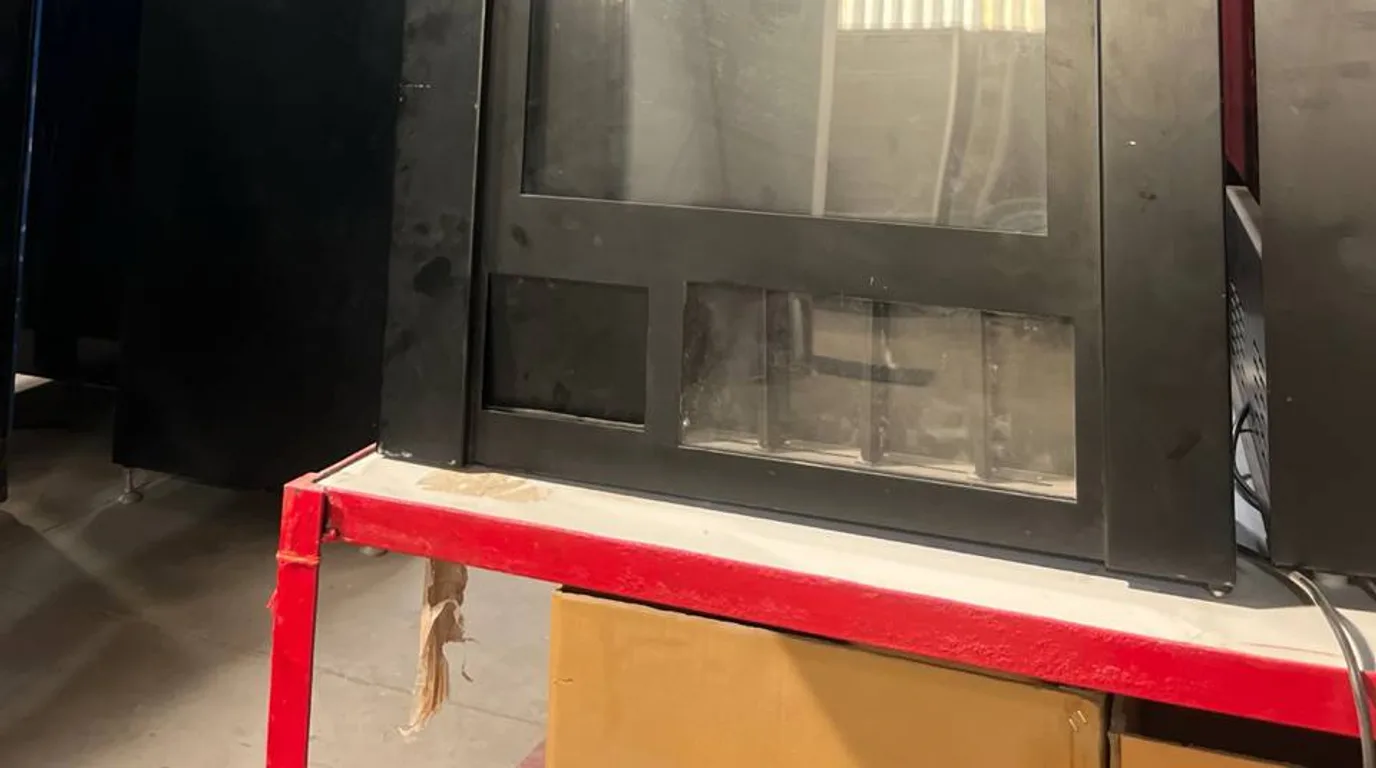 Four types of drink vending machines shown side by side in a showroom