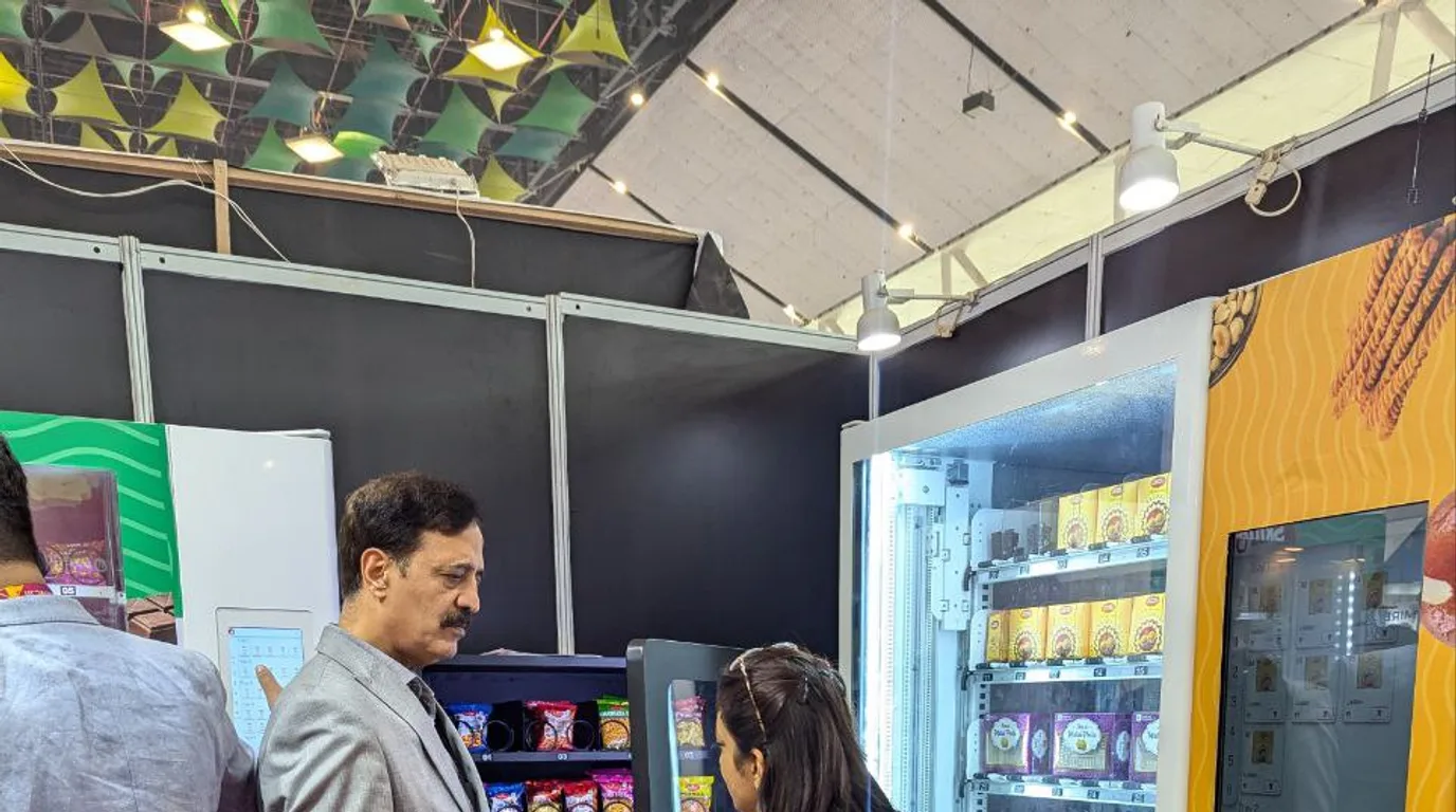 Electronics vending machine selling chargers and power banks in an airport terminal