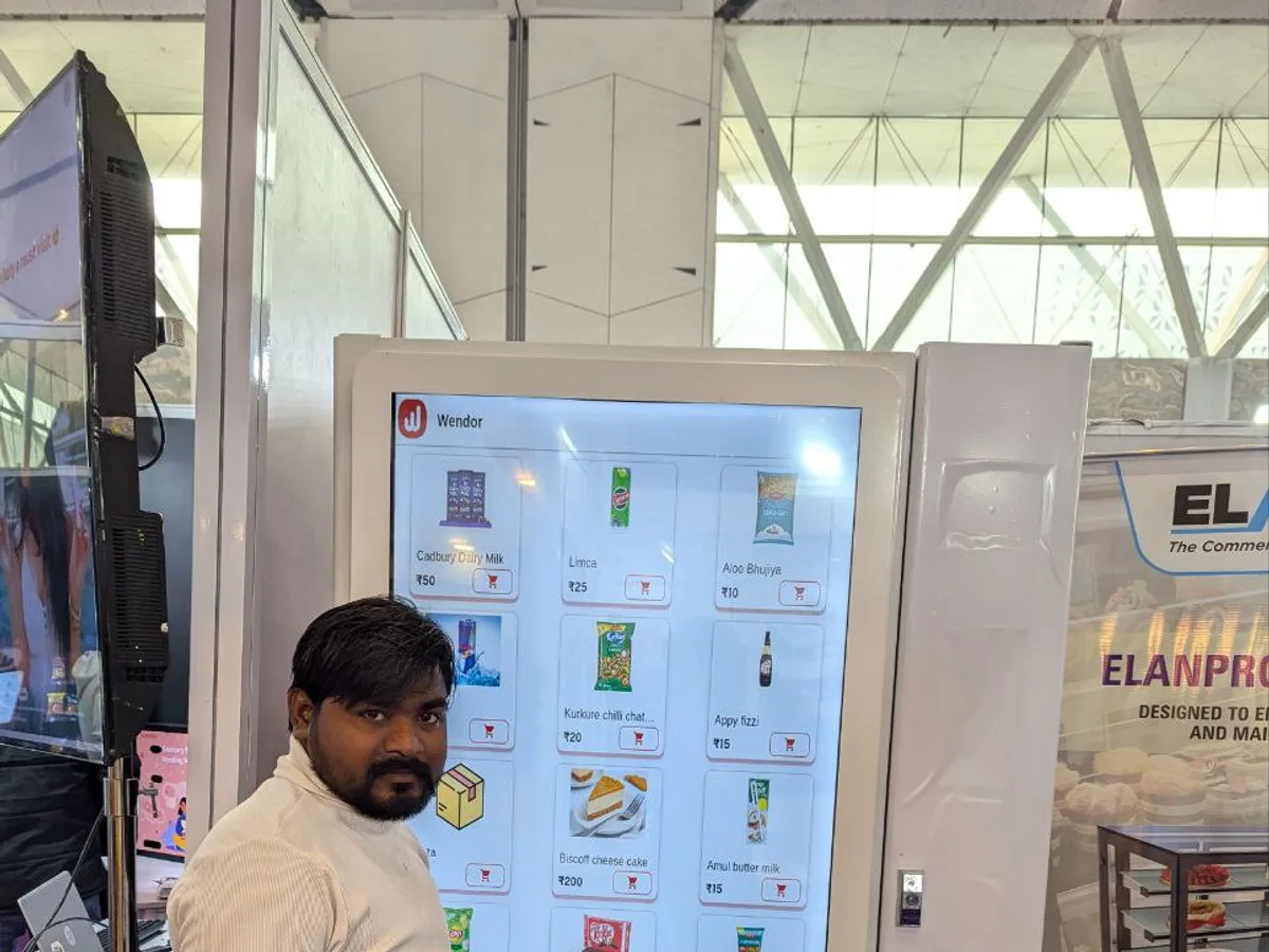 Specialty vending machine with an ROI chart tablet illustrating profitability