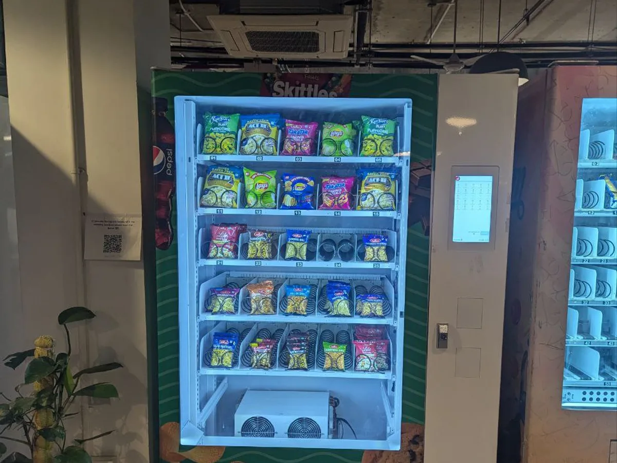 Close-up of a vending machine's ID scanner and face-analysis age-verification module