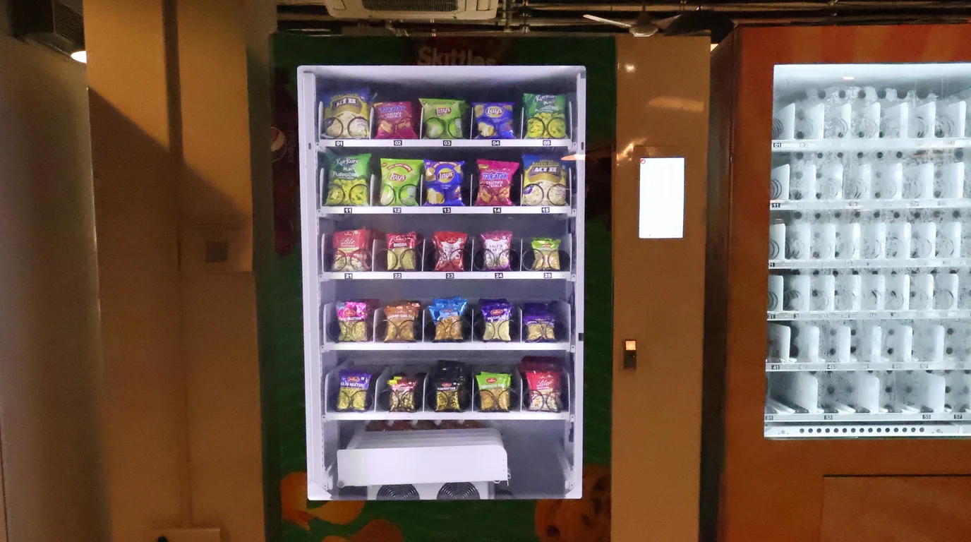 Operator scouting a busy location to place a vending machine