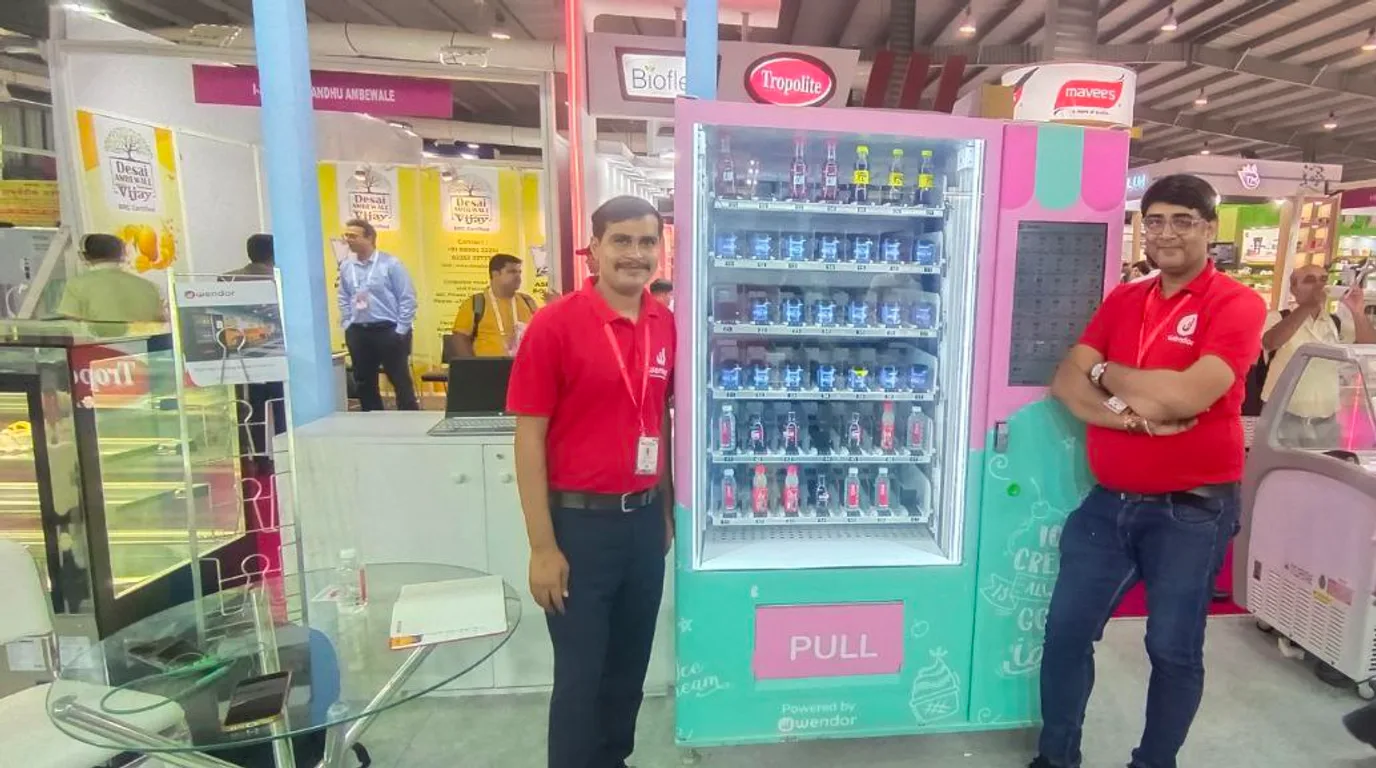 A group of specialty vending machines including ice, pizza, beauty, electronics, and reverse types