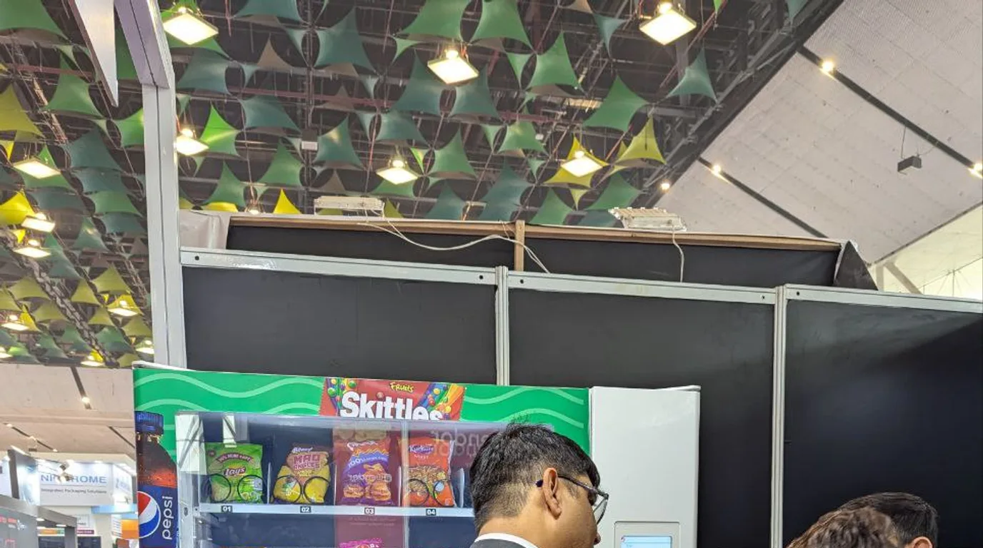 Inspector checking the temperature of a refrigerated vending machine in Florida
