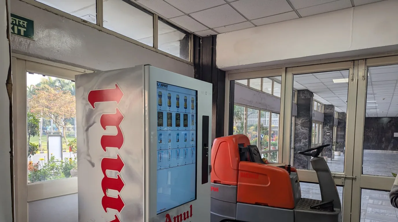 Entrepreneur scouting a high-foot-traffic spot for a vending machine