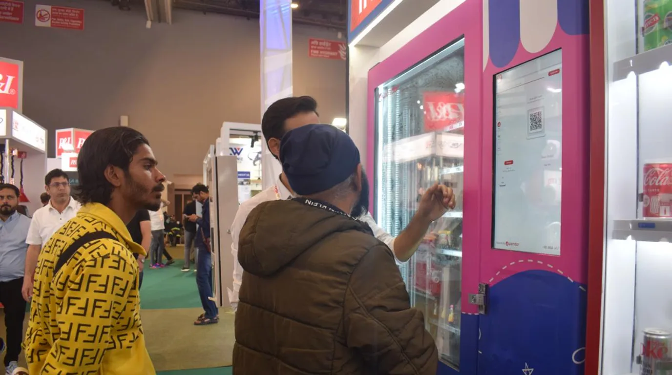 Modern vending machine with local-language interface in a high-traffic location